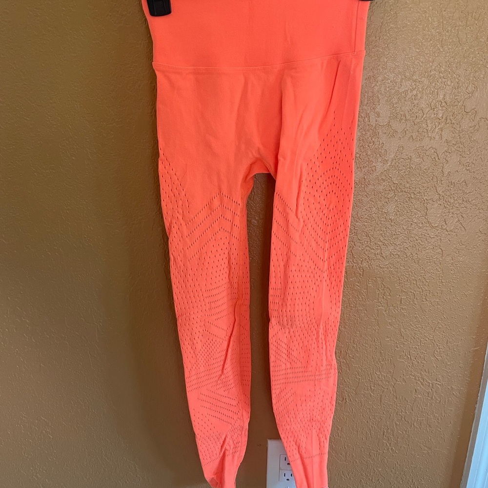 Super cute Free People neon leggings with design